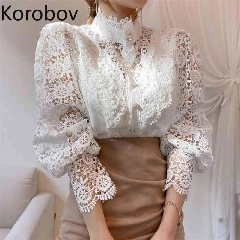 Korobov coréen Chic Qutumn nouveaux chemisiers en dentelle chic Vintage évider sexy simple boutonnage chemises à col montant Blusas Mujer 210430