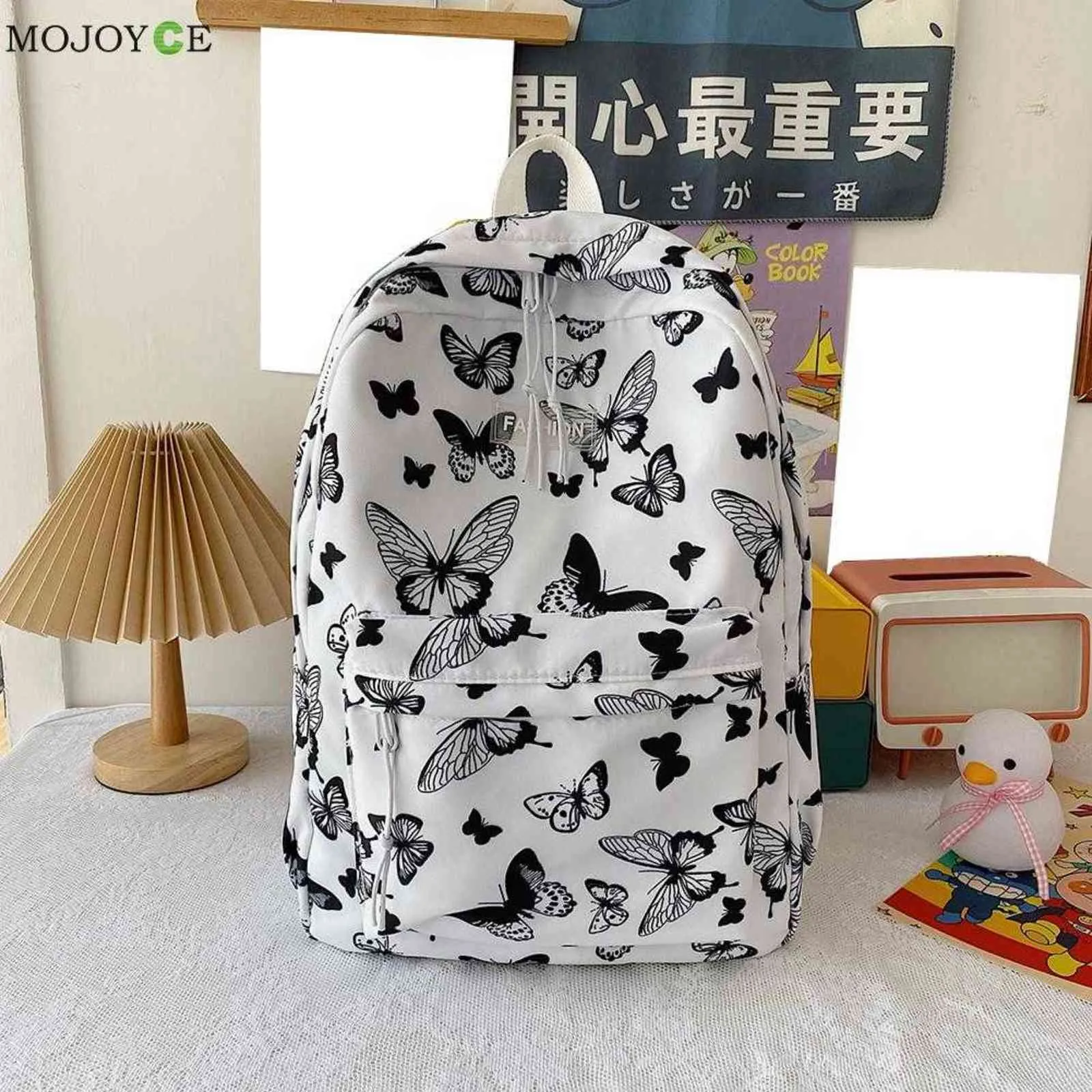 Kvinnor hund fjäril fjäder tryck ryggsäckar casual girls high school bag stor kapacitet knapsack kvinnlig multi-pocketstravel väska y1105