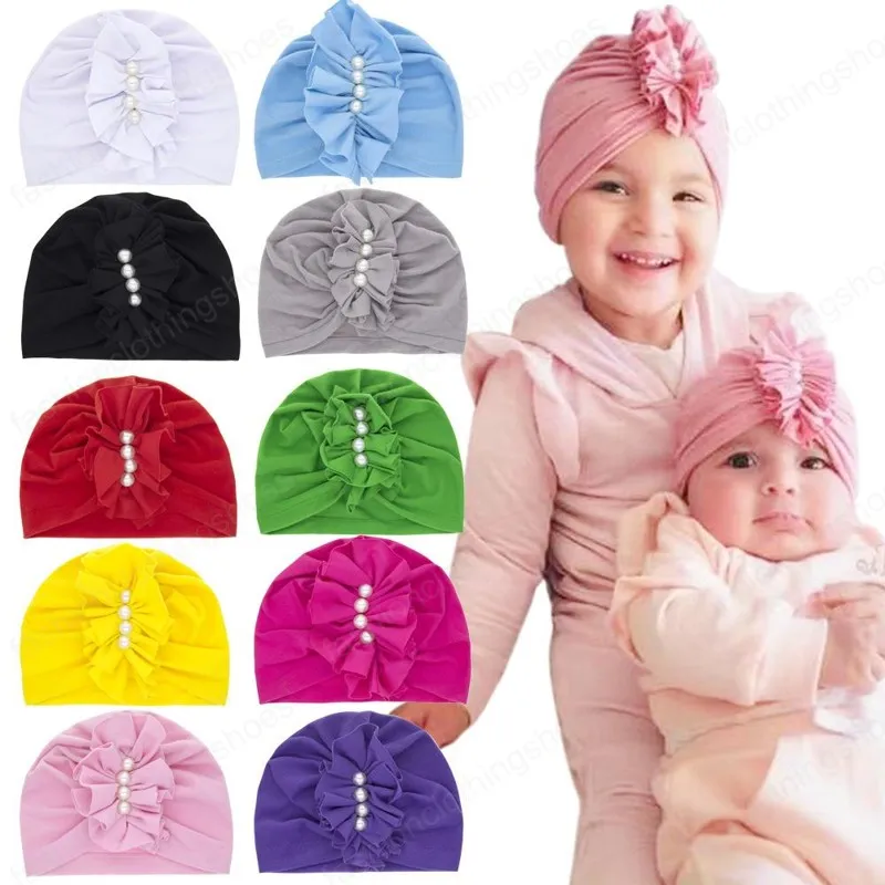 幼児ベビーハットプリーツの帽子の固体の色子幼児の子供子供のビーニーターバン帽子10色