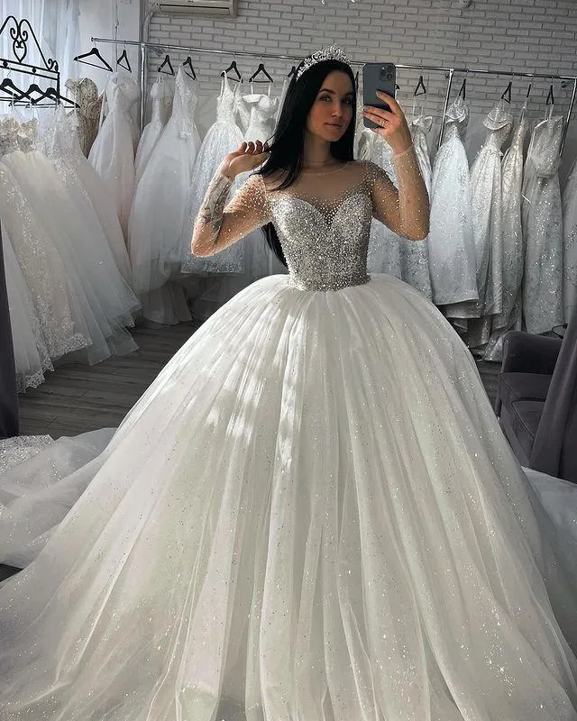 Arabisch Aso Ebi Luxuriöse Ballkleid-Hochzeitskleider in Übergröße, transparenter Ausschnitt, lange Ärmel, Perlen, abgestufter Tüll, Kapellenschleppe, Hochzeitskleid, Brautkleider, Vestido de Novia