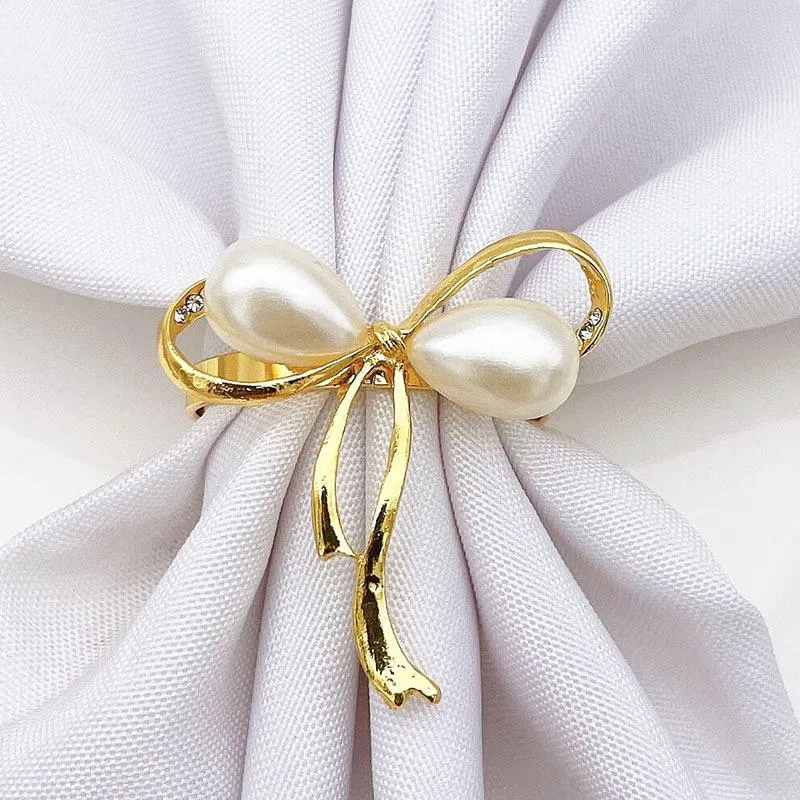 Servettringar 6pcs Golden Cute Pearl Bow Shape Serviette Spänne för bröllopsfestbord Dekoration Köksartiklar