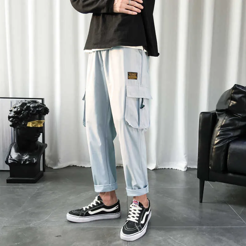 2021 nuovi pantaloni cargo Hip Hop moda uomo Harajuku Harem Pant nero streetwear pantaloni pantaloni sportivi multi-tasca pantaloni casual da uomo Y0927