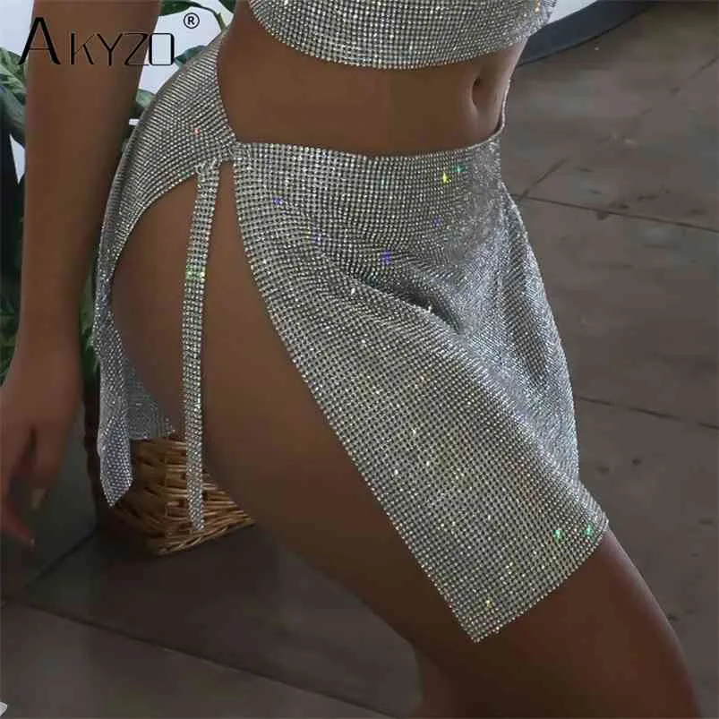 AKYZO Feminino Sexy Clubwear Dividido Minissaia Strass Nova Chegada Luxo Metal Lantejoulas Saia Glitter Dourado/Prata 210330