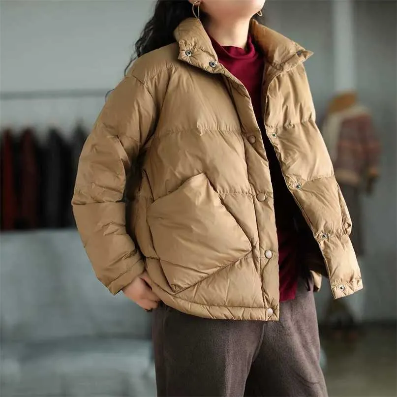 Chaqueta ligera de plumón de pato blanco suelta de gran tamaño 90 para mujer, estilo de invierno, solapa literaria, bolsillo asimétrico, Top cálido 211008