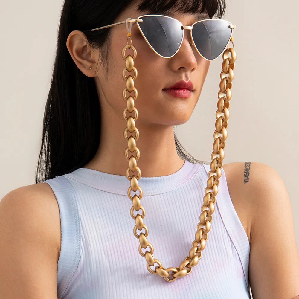 Chunky gold sunglasses sales chain