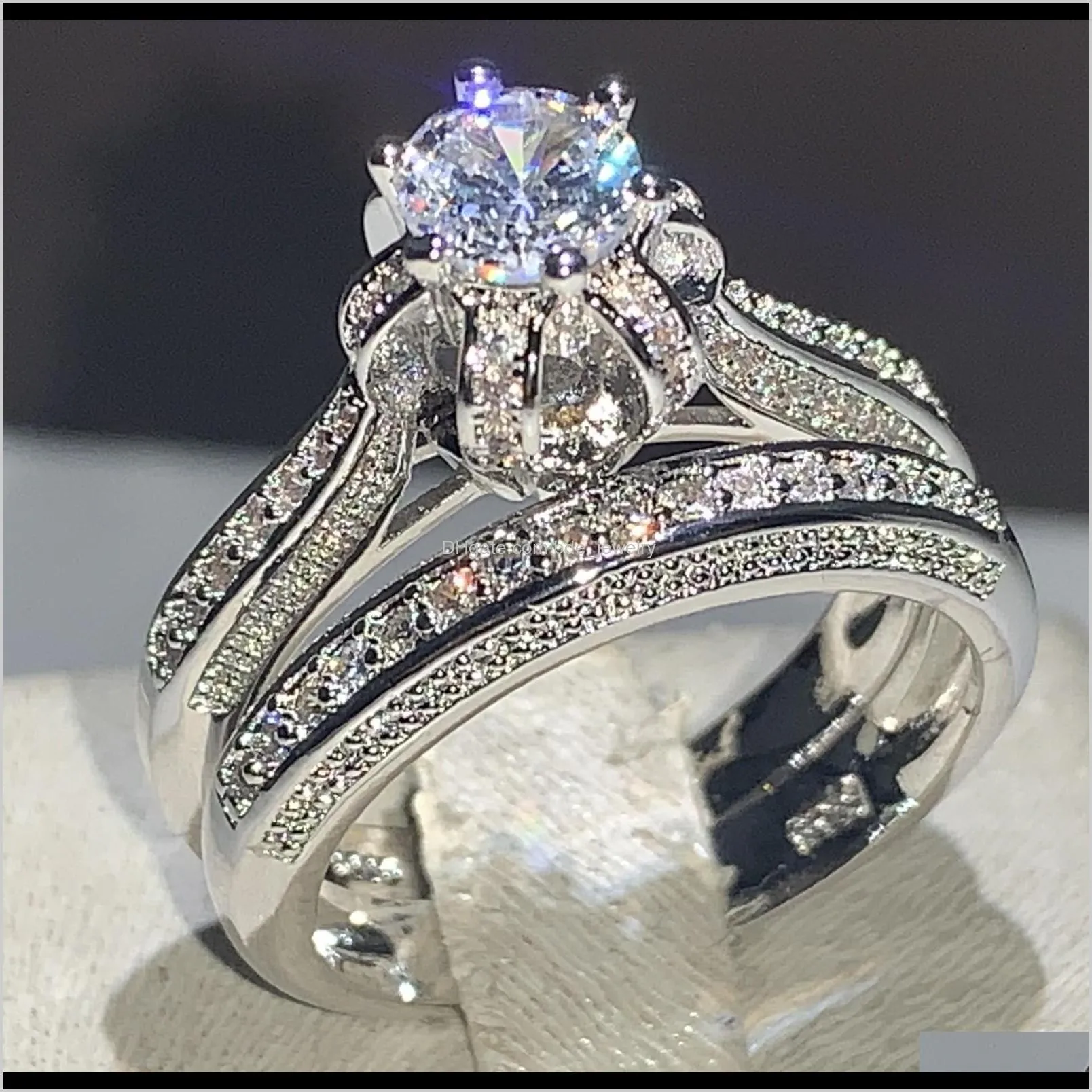 Ringar smyckeninfinity märke unika lyx smycken 925 sterling sier runda form vit topaz cz diamant sona kvinnor bröllop brudband ring se