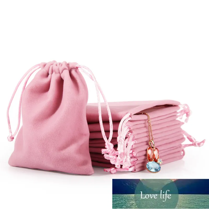 O presente cinzento cor-de-rosa do presente da jóia de embalagem dos sacos de embalagem dos sacos de veludo