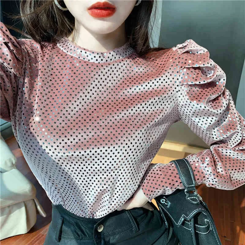 pink and black polka dot blouse