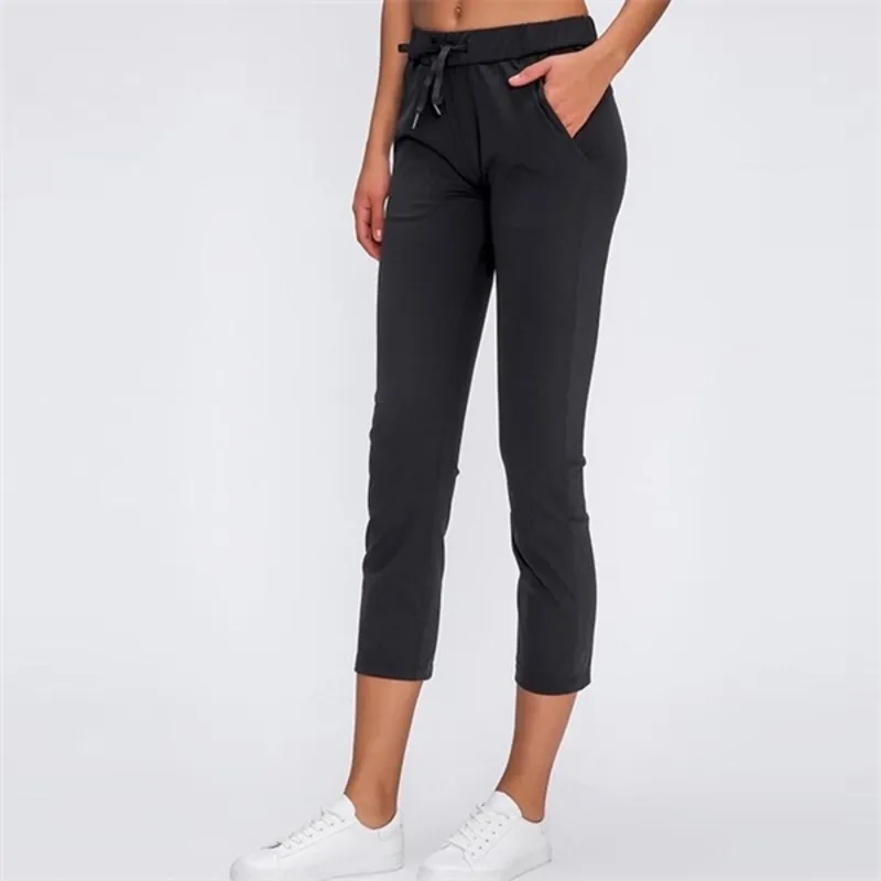 2021 Women Outside Pockets Capris Casual with Wide Leg Leggings Calf-Length Pants 4-sided stretch fabric pants Q0801