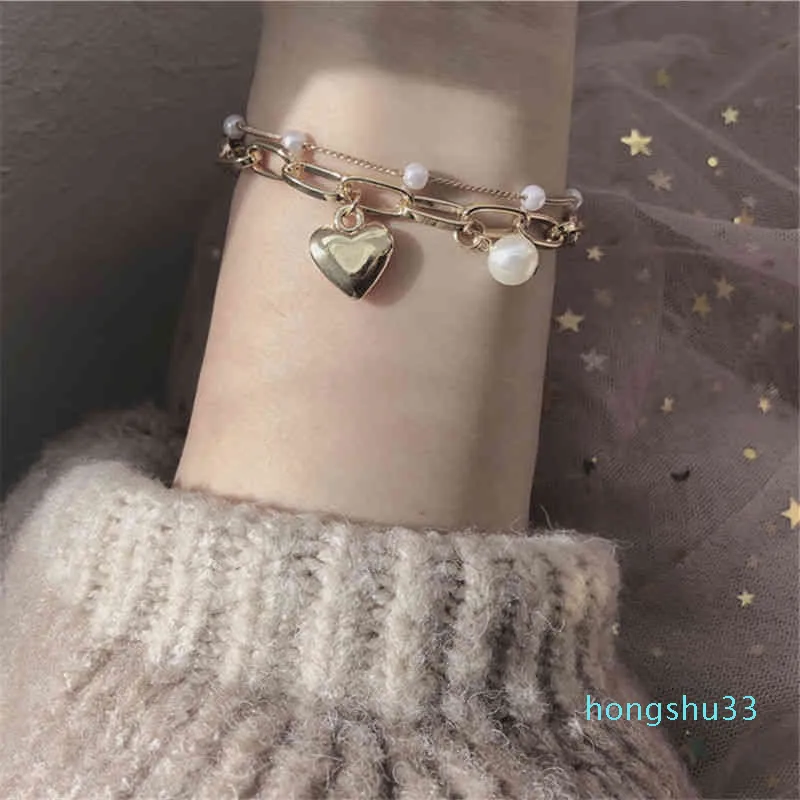 Double layer love pearl bracelet lovely sweet girl Bracelet temperament versatile metal Peach Heart Pendant