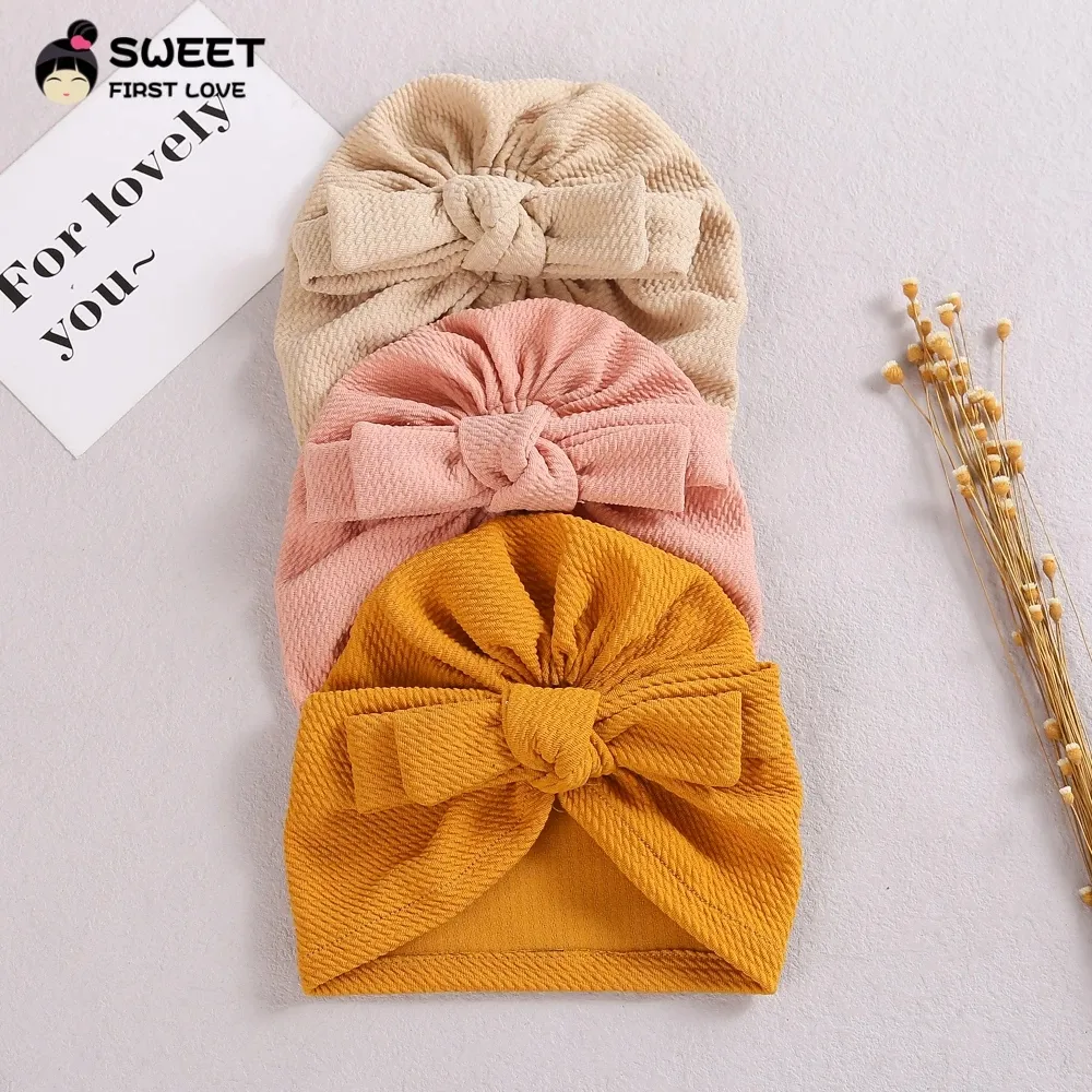 Bonnets de coton de bébé massif mignon double couche Bowknot Turban chapeaux doux bouchons élastiques doux pour les filles du nouveau-né