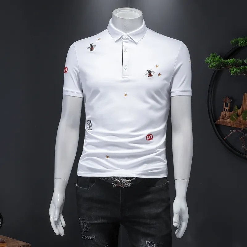 Polo a maniche corte in cotone alla moda e bella con fondo ricamato da uomo 2023 primavera ed estate nuova tendenza business casual risvolto top