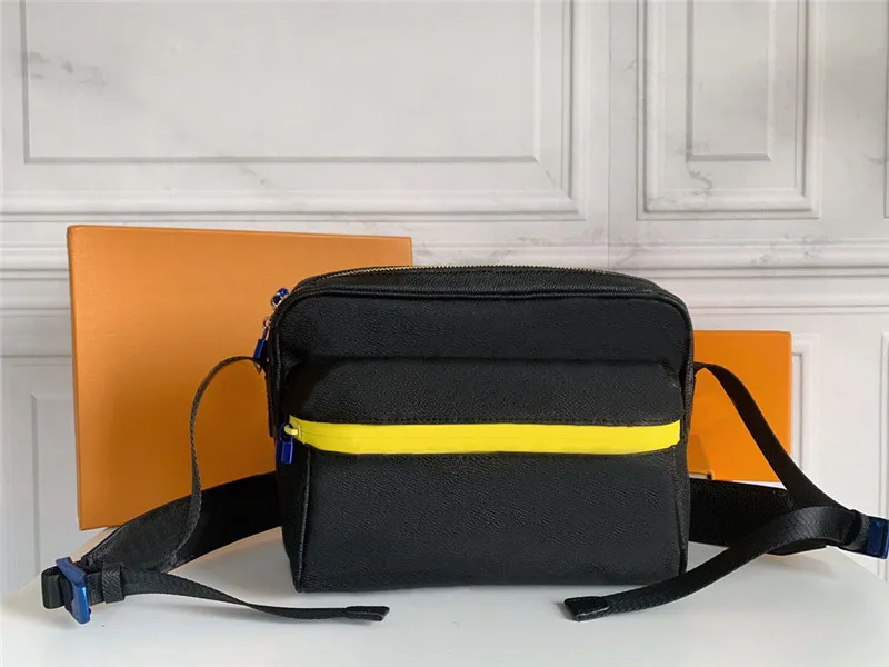 Top fashion men`s women`s messenger bag, 25.5 cm long, with drawstring and colorful metal accessories, showing sporty style, is an ideal companion for business work