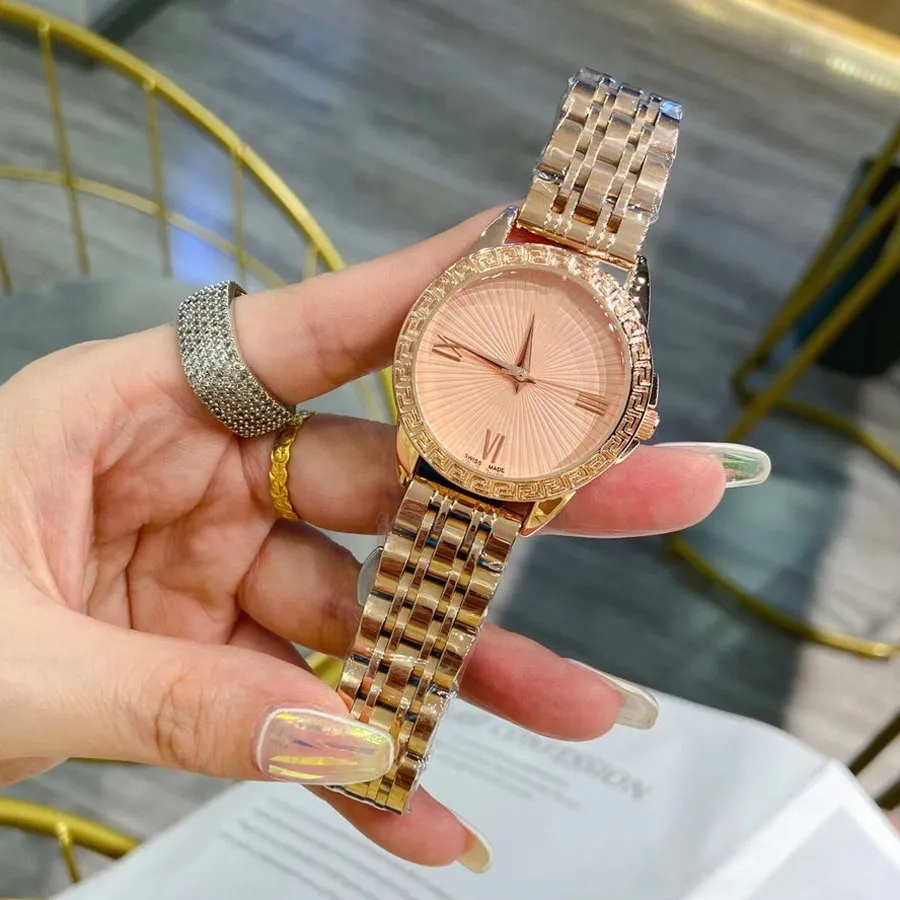 DHgate.com:Womens Fashion Steel Metal Band Wrist Watch