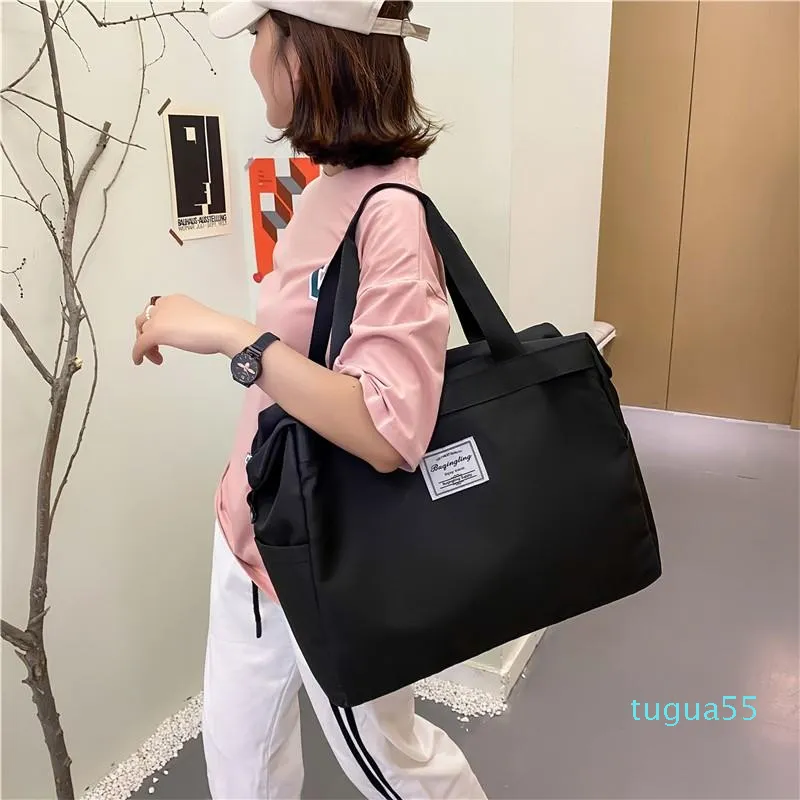 Bolsas de lona de diseñador Gran capacidad Gimnasio Fitness Bolsa deportiva Bolsa de viaje impermeable para mujeres Moda Fin de semana Embalaje Cubes294f