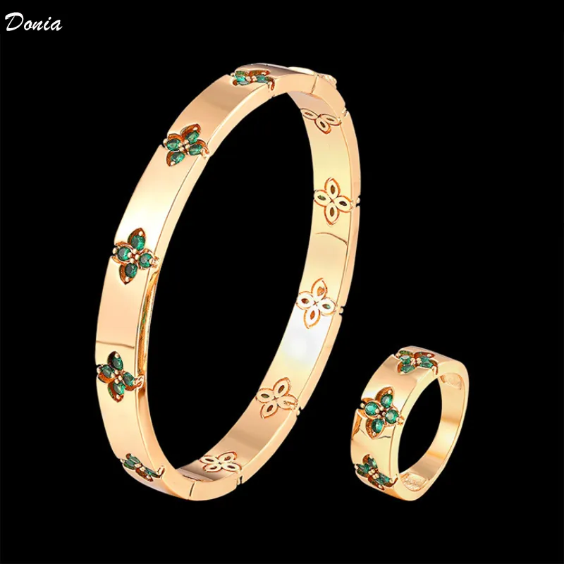 Donia Jewelry Pulseira de Luxo Flor de Quatro Folhas Pulseira de Aço de Titânio Exagerada Micro-incrustada Zircônia Colorida Caixa de Presente de Estilista de Moda Europeu e Americano