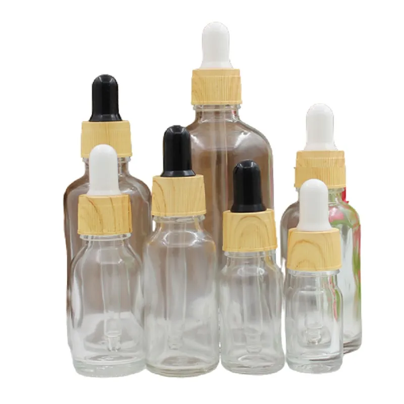 Clear Glass Dropper Bottle Cosmetic Packing Refillable Containers Empty Essential Oil Pipette Vials False Wood Plastic Lid 5ml 10ml 15ml 20ml 30ml 50ml 100ml