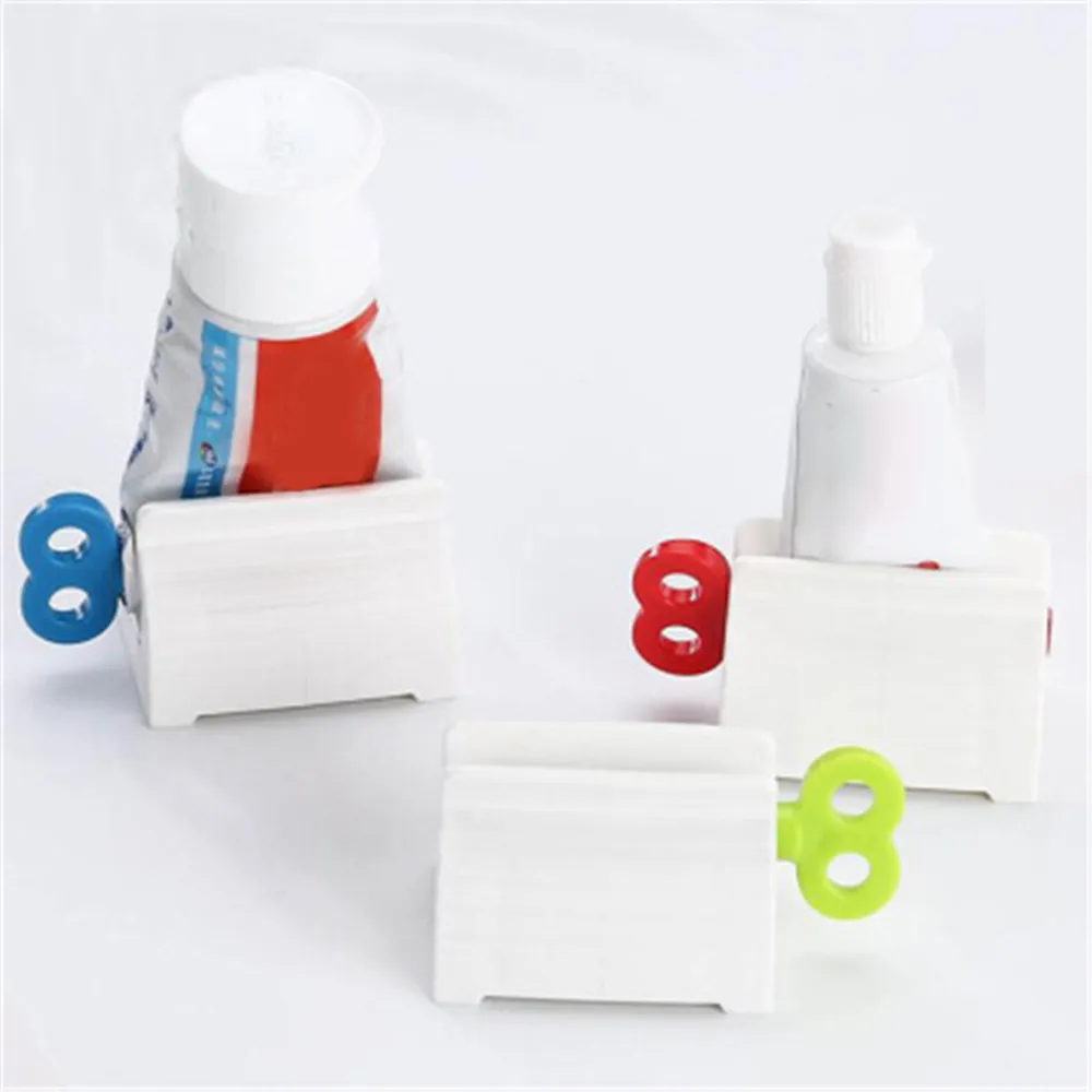 1Pc 3 Colori Casa Tubo di Dentifricio in Plastica Forniture per Servizi Igienici Spremiagrumi Dispenser Facile Supporto per Rotolamento Forniture per Bagno Accessori per la Pulizia dei Denti