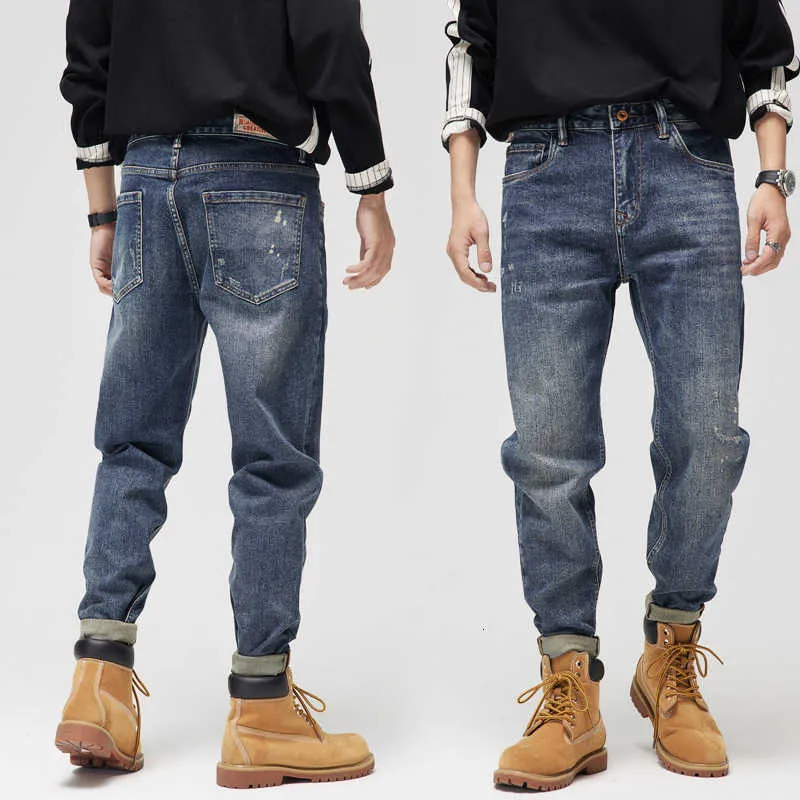 Jeans da uomo alla moda in stile coreano retrò blu larghi pantaloni casual in denim hip-hop da strada strappati a gamba larga