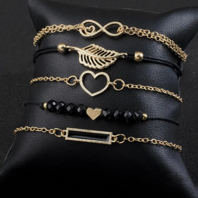 Pcs / set kärlek hjärta oändlighet symbol charm armband för kvinna guld länk kedja ihålig fjäder svart pärlor braclet flicka