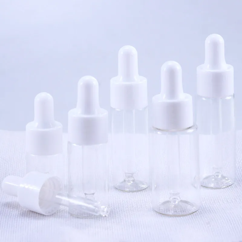 50 sztuk / partia 5ml 10ml 15ml 20 ml Clear Szkło szklane słoiki butelkowe fiolki z pipetą do butelek olejku perfum kosmetycznych