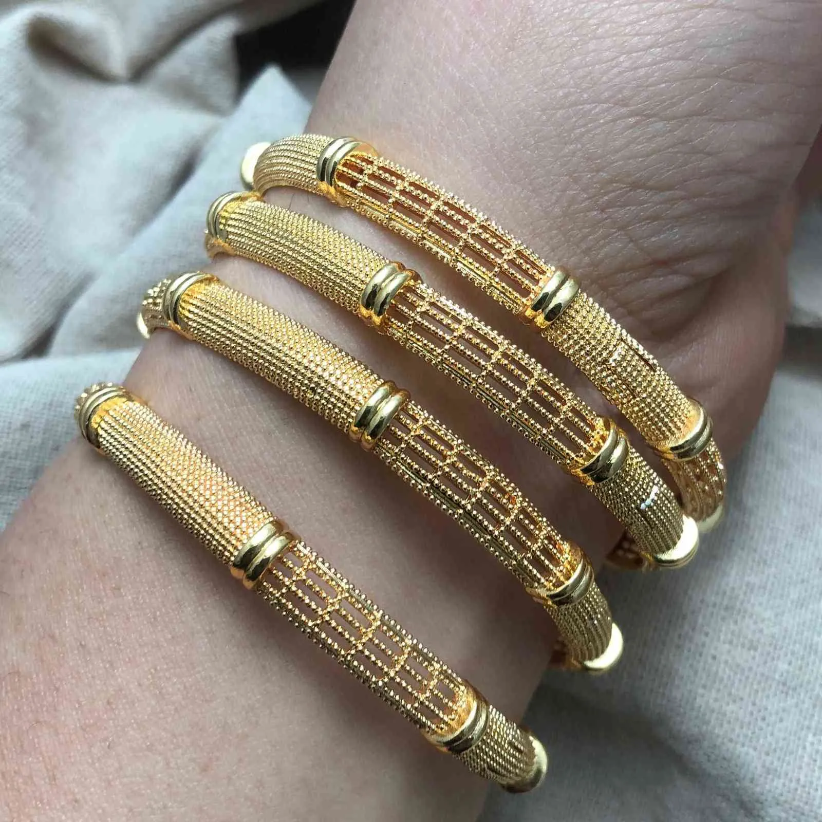 Gold bangles for mom hotsell