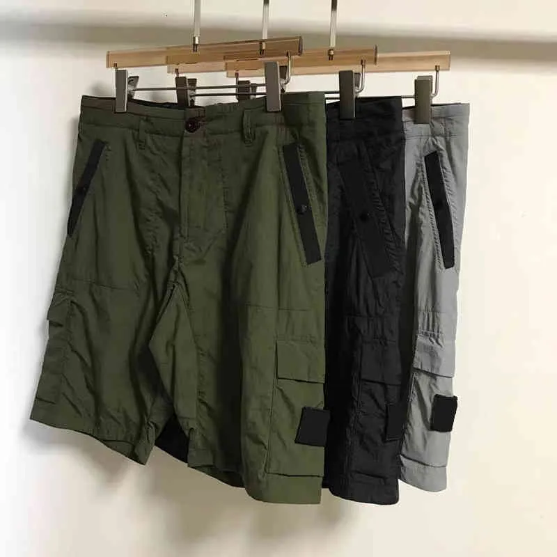 Summer Metal Nylon Men's Shorts Chao Beach Pants Solid Color Tooling Capris Snabbtorkning Leisure Europeiska och amerikanska mode mångsidiga kläder