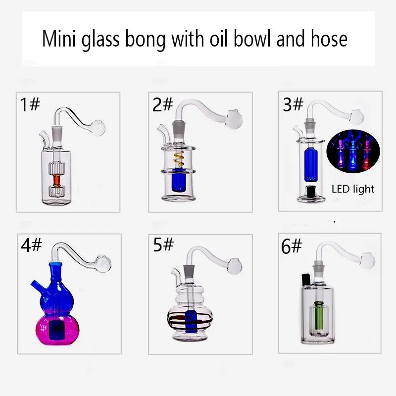 Mini bécher en verre Bongs Conduites d'eau brillent dans l'obscurité Plates-formes pétrolières en verre ultra-bon marché Bongs avec tuyaux et tuyaux de brûleur à mazout en verre