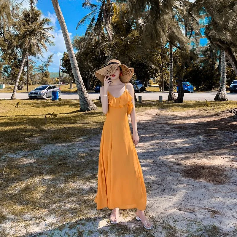 비치 스커트 여성 여름 하이난 산 야 해변 휴가 휴가는 얇은 보헤미안 긴 슈퍼 요정 옐로우 드레스 여자 수영복이었다