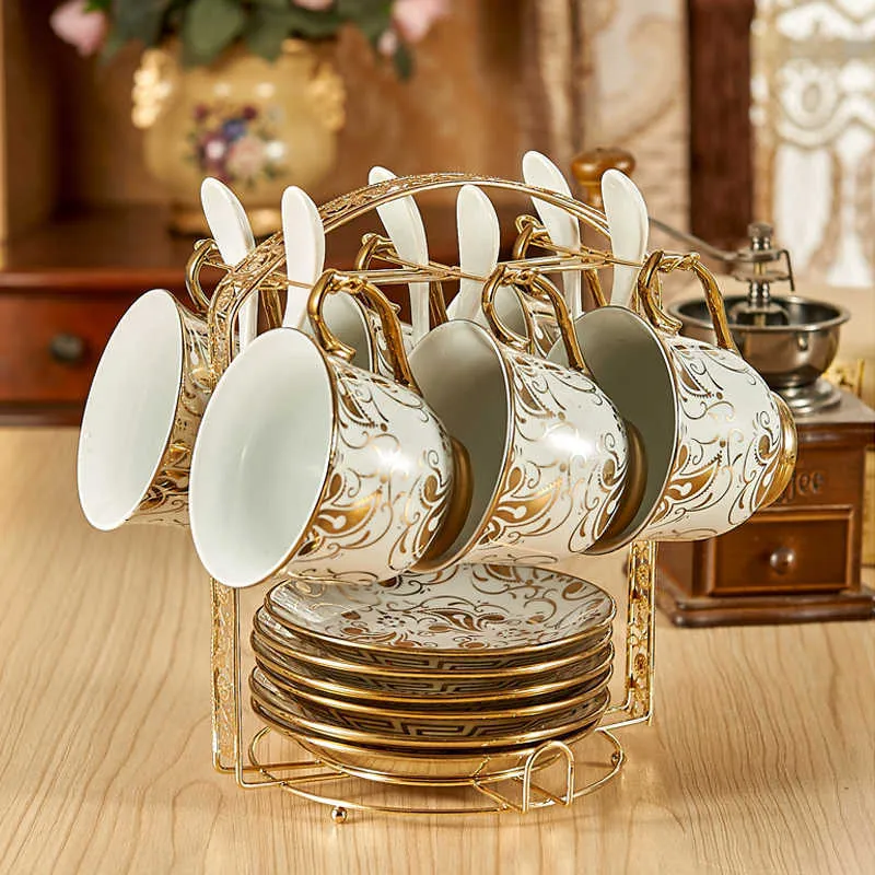 ヨーロッパの陶磁器茶イギリスのサイドボーン中国コーヒーカップセット皿の砂糖の弓が付いているランド磁器の家の茶碗の贈り物
