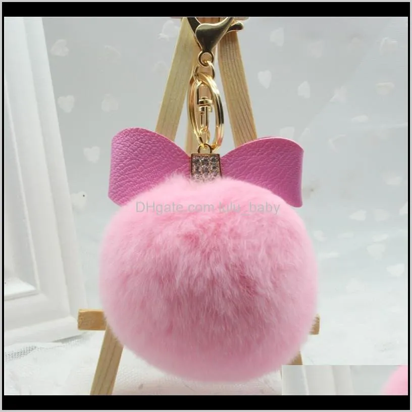 luxury 8cm genuine fur pom poms ball keychain with ribbon gold metal key holders for purse bag girl car keyring
