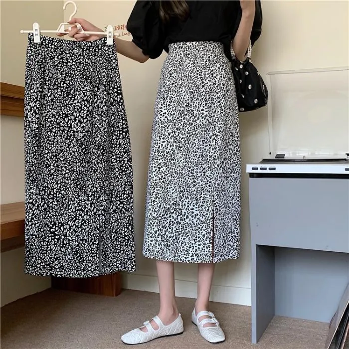 Falda de primavera y verano para mujer 2021 A-line versión coreana de faldas de longitud media con abertura floral salvaje de cintura alta