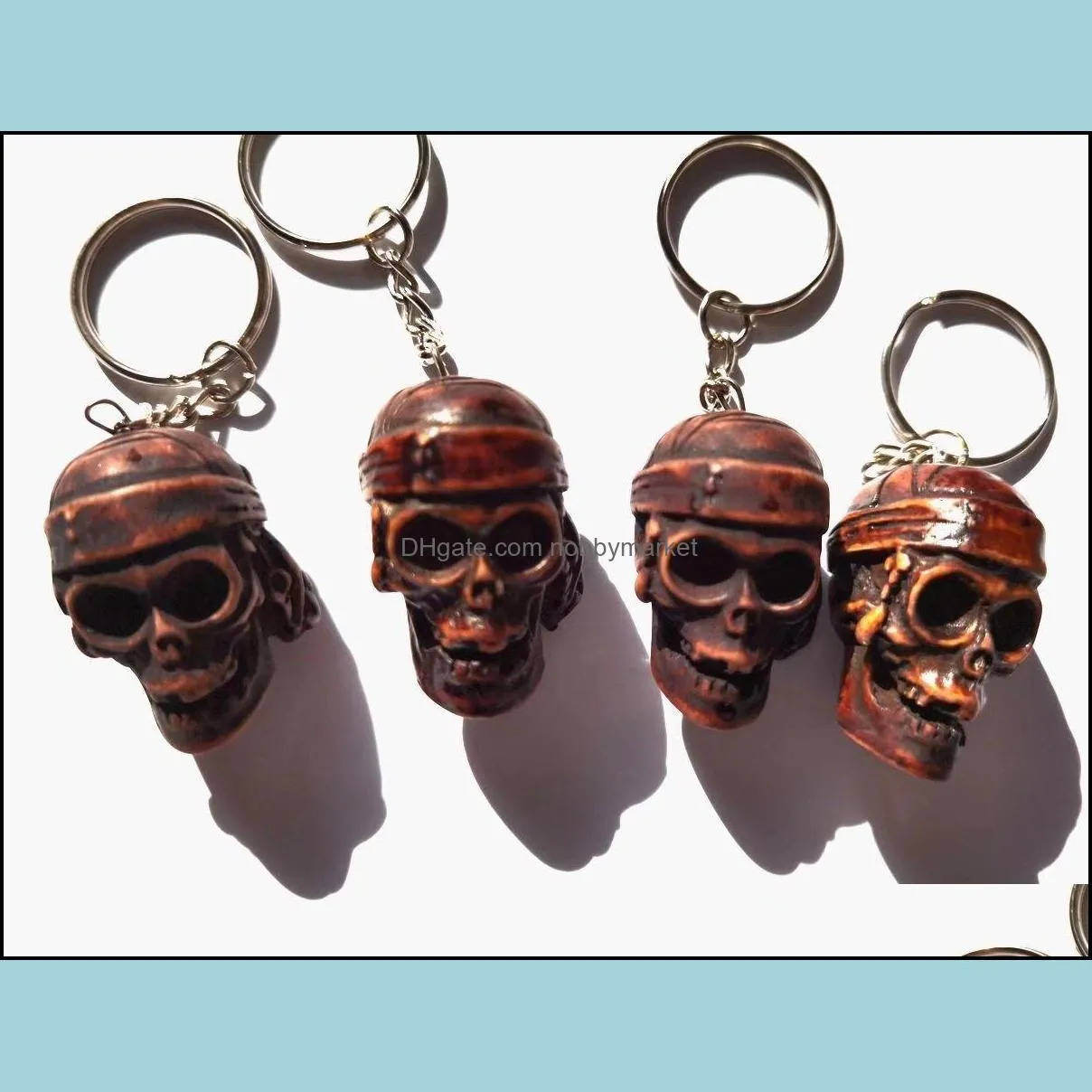 12 pcs Men Skeleton Punk Rock Key Chain Tibetan Demon Skulls Creative Fashion Keyring Gift