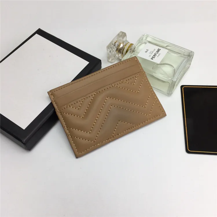 Lady`s card bag. It is made of calf leather, quilted figure pattern and top overseas hardware. With packing box, free delivery