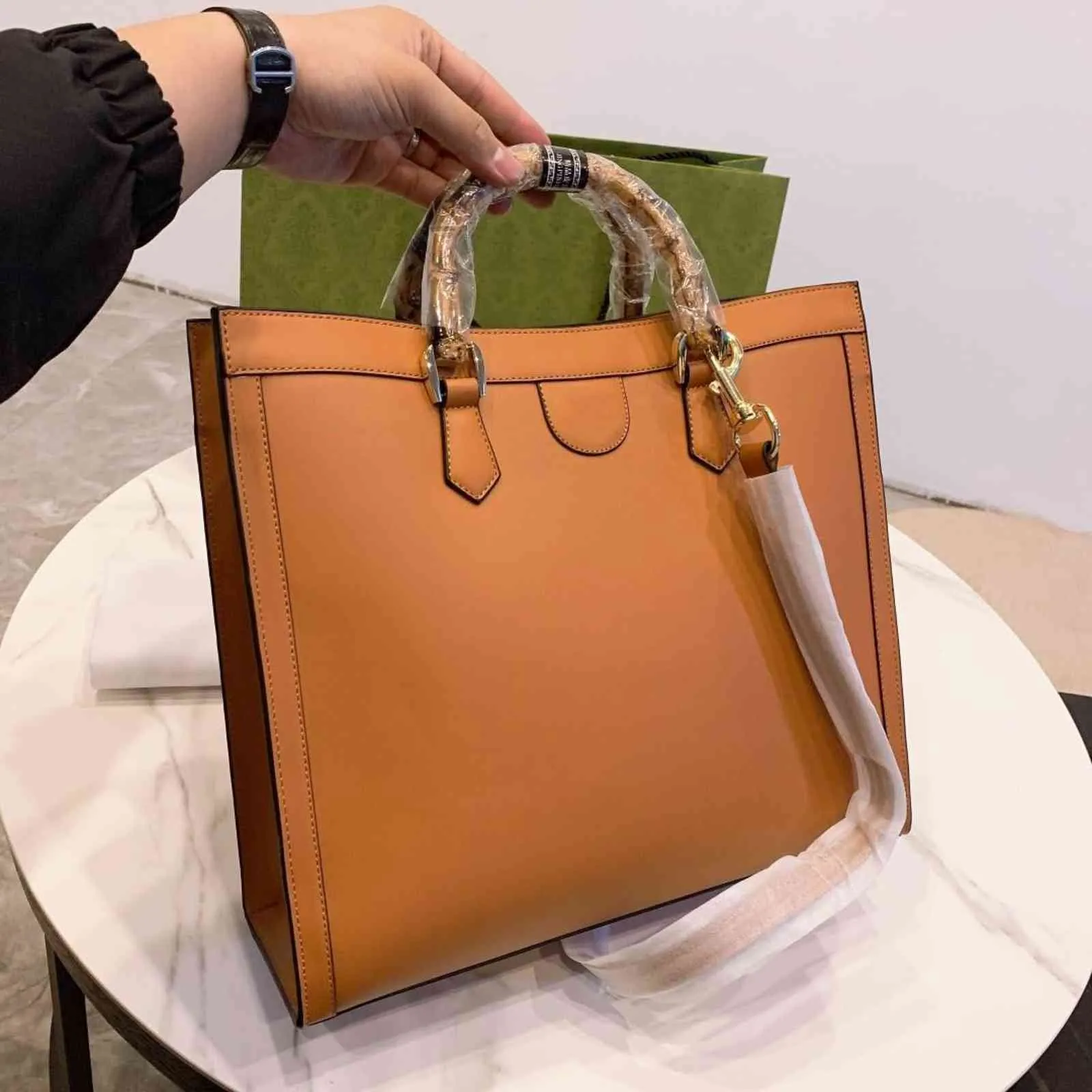 Exquisite square Tote hand-held exquisite design muyuan slubby bag classic design solid color men`s and women`s handbag special handle