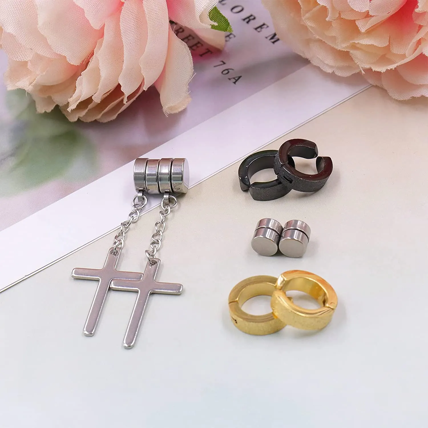 MAGNETIC cross EARRINGS AVAILABLE in... - ROYAL Empire SALES | Facebook