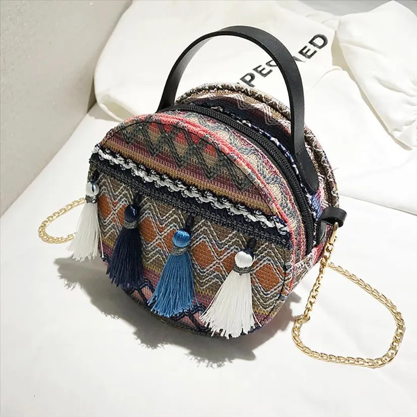 Ethnic style cylinder bag Personalized woven pattern tassel Pu Women shoulder bag cute Round Purse Tassel Packet Shoulder Bag