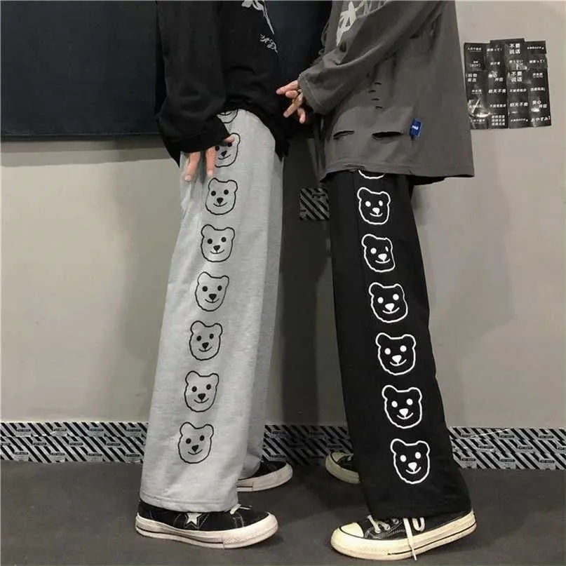 Houzhou estilo coreano largo perna calças mulheres baggy harajuku impressão dos desenhos animados jogging esportes hippie preto calças casuais 211115