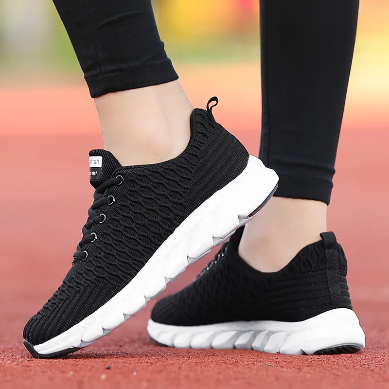 Athletic Women's running shoes lightweight fly mesh breathable black white pink sports trendy female casual sneakers trainers