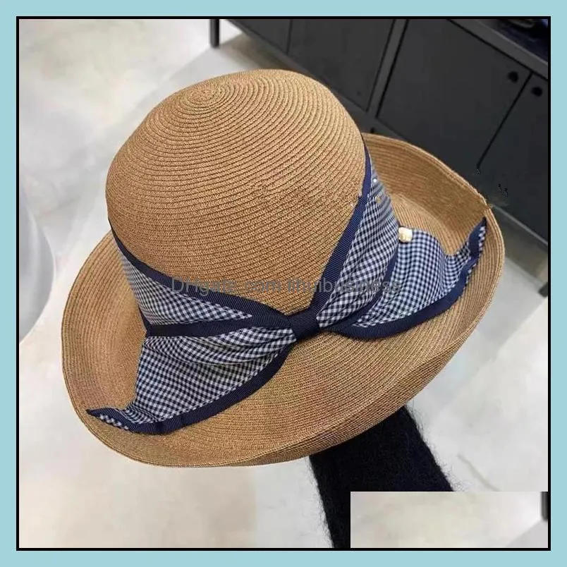 202103-xiaoli new summer plaid bowknot japan style big brim beach holiday paper straw lady sun cap women leisure hat Y0910