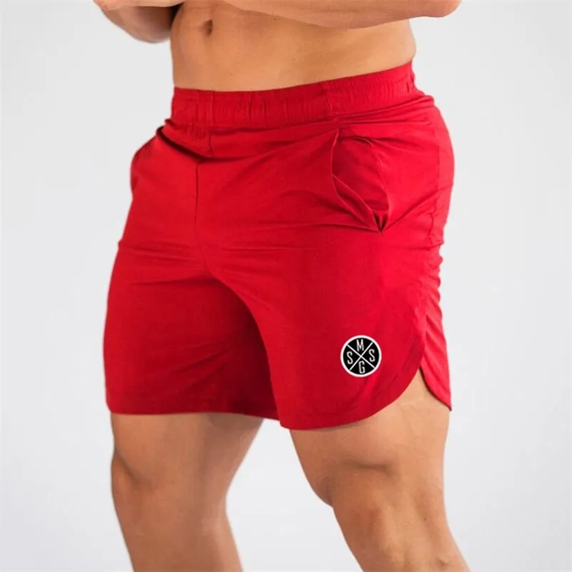 MuscleGuys Herrbräda Shorts Sexig strand Bermuda Wear Sea Short Men Gym Shorts Snabbtorkare Sweatpants Fitness Shorts 210401