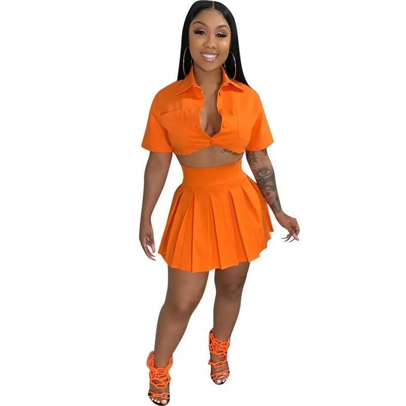 Versatile Designer Crop Top Dress Set With Button Detail Short Skirt And Patch Bag Fashionable And Sexy From Bossbaba 11.41 DHgate.Com