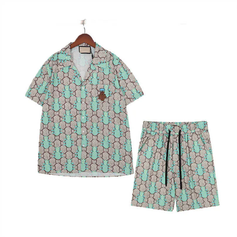 2023 HAWAII LITET LITERA DRITRY PLABY Koszulki Mętna jedwabna koszula kręgła swoboda mężczyźni Summer Sukienki z krótkim rękawem luksusowa marka Pajama zestaw m-3xl