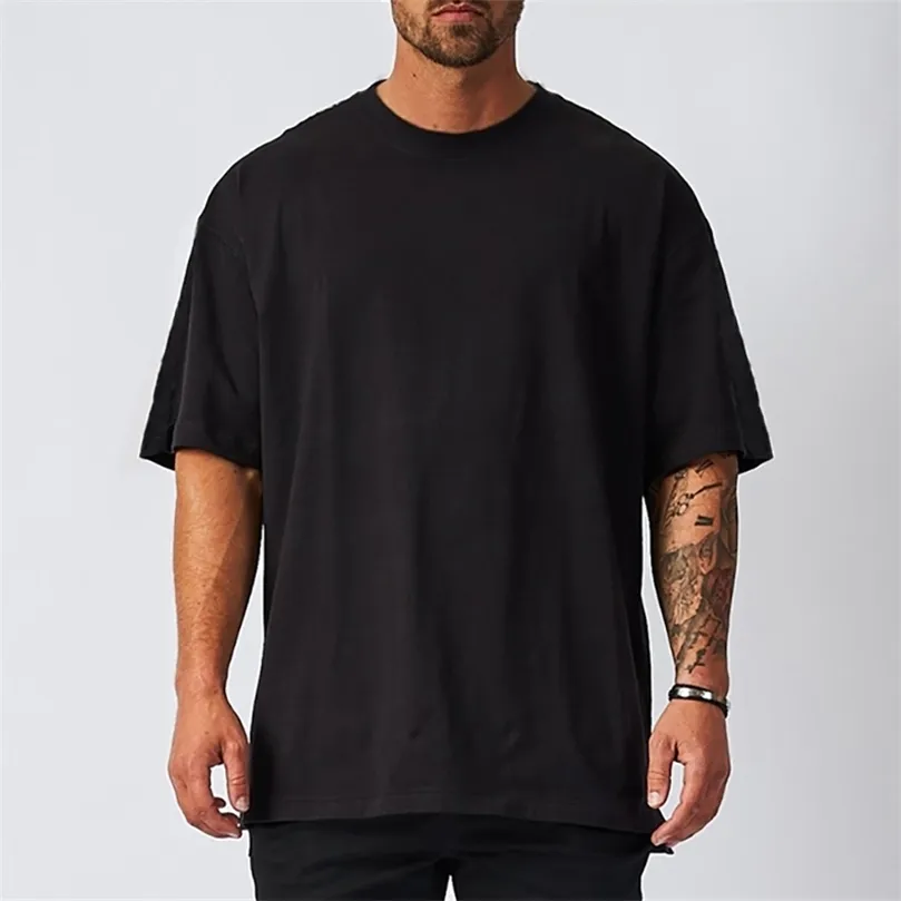 Mens Overized Fit Short Sleeve T-shirt med tappad axel Löst Hip Hop Fitness T-shirt Summer Gym Bodybuilding Tops Tees 220509