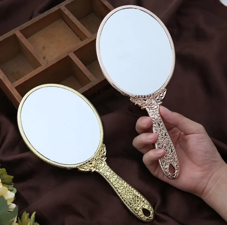 Espelhos de maquiagem portátil Romântico Vintage Hold Hold Zerkalo Gilded Handled espelho cosmético redondo oval Presente de cômoda de ferramenta SN4493