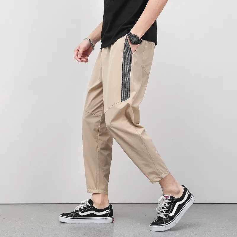 Pantaloni da uomo coreani estivi con giunture sottili a 9 punti Pantaloni casual con gamba elastica allentata in seta di ghiaccio Tendenza di ventilazione 220816