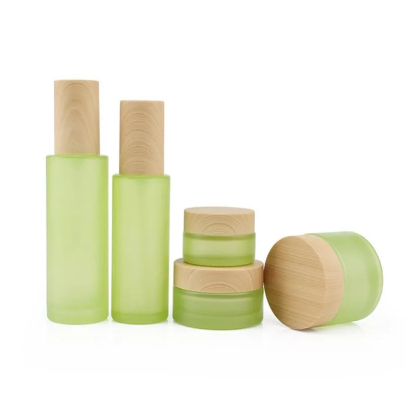 Garrafas de bomba de potes cosméticos de vidro verde com plástico com tampa de madeira de madeira 20g 30g 50g 20ml 30ml 40ml 60ml 80ml 100ml 120ml Loção de corpo Creme de toner de face Toner Recipiais de água