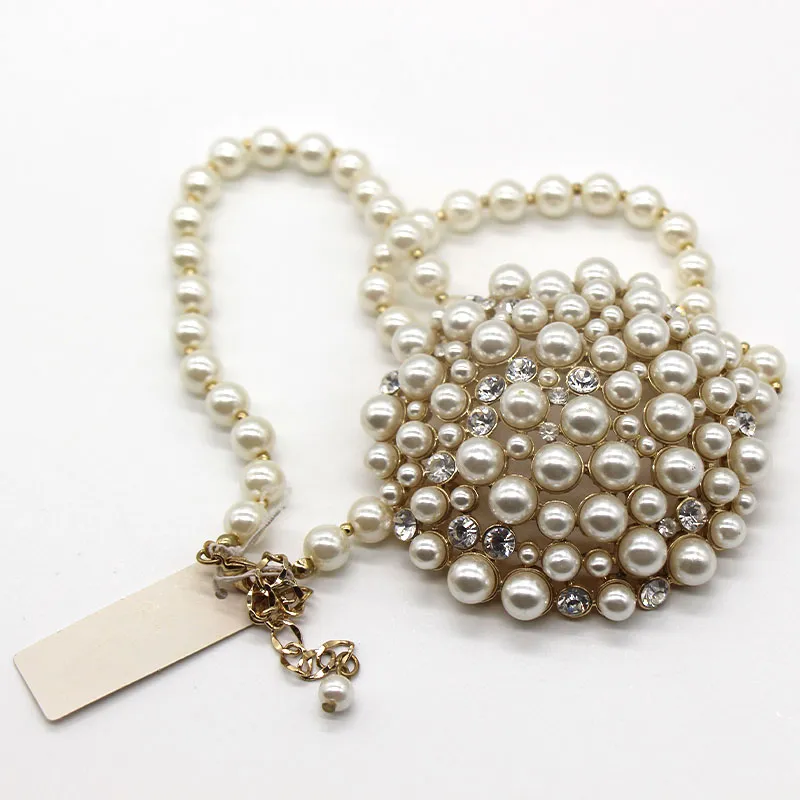 Charme créative de création de niche design créatif rond perle alliage collier pendentif fête robe décoration