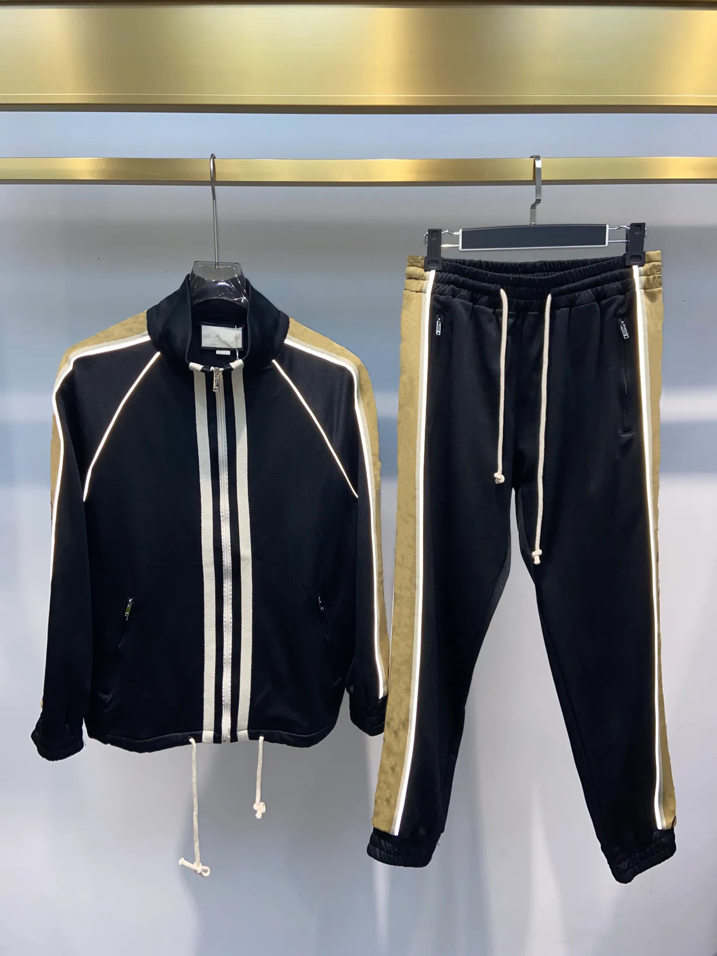 Autumn and Winter fashion brand designer tracksuits US size luxury tracksuit high quality reflective stripe ribbon design mens black leisure sports Tracksuits