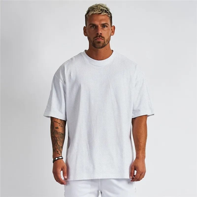 T-shirt oversize da uomo fitness in maglia bianca T-shirt oversize da uomo hip-hop streetwear allentato abbigliamento da palestra mezza manica t-shirt bodybuilding W220409